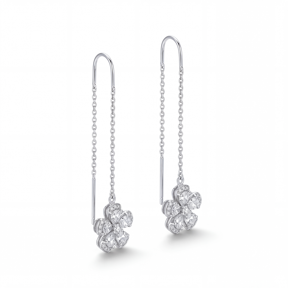 Shop elegant 18K white gold diamond threader earrings at GoldFather Jewelry at North Miami Beach. Discover modern diamond earrings with a delicate, sophisticated design. 