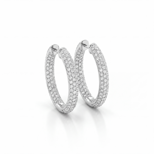 Shop luxurious 18K white gold inside-out hoop earrings featuring 6.12 carats of diamonds. Discover brilliant diamond hoops at GoldFather Jewelry.